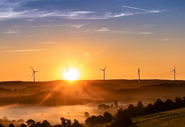image of windmills during sunrise